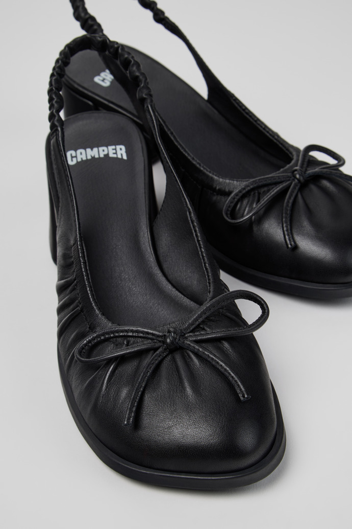 Close-up view of Kora Black Leather Semi-Open Shoes for Women.