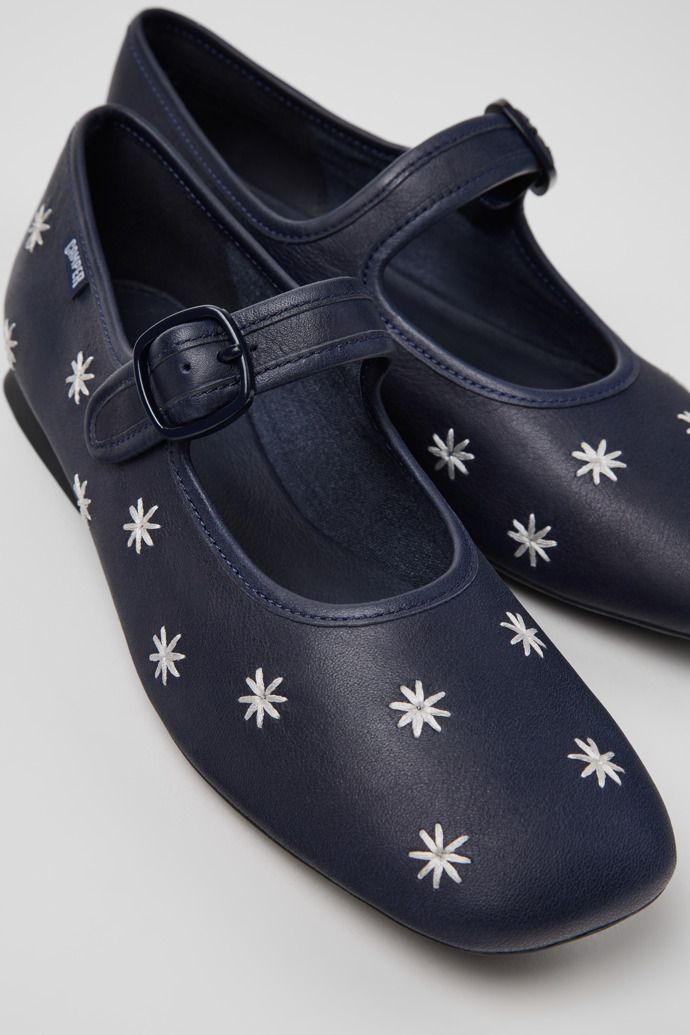 Close-up view of Casi Myra Blue Leather Ballerinas for Women.
