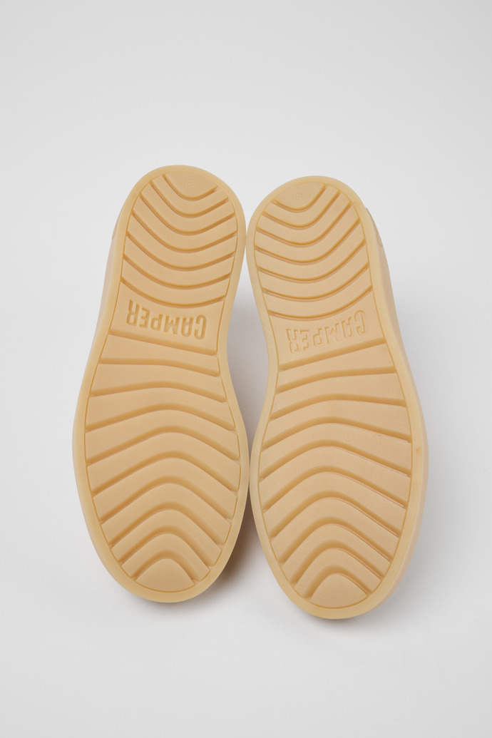 The soles of Runner Twentyfive Beige Suede Leather Sneakers for Women.