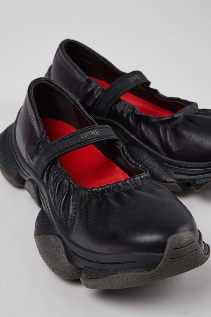 Close-up view of Karst 2 Black Leather Sneakers for Women.