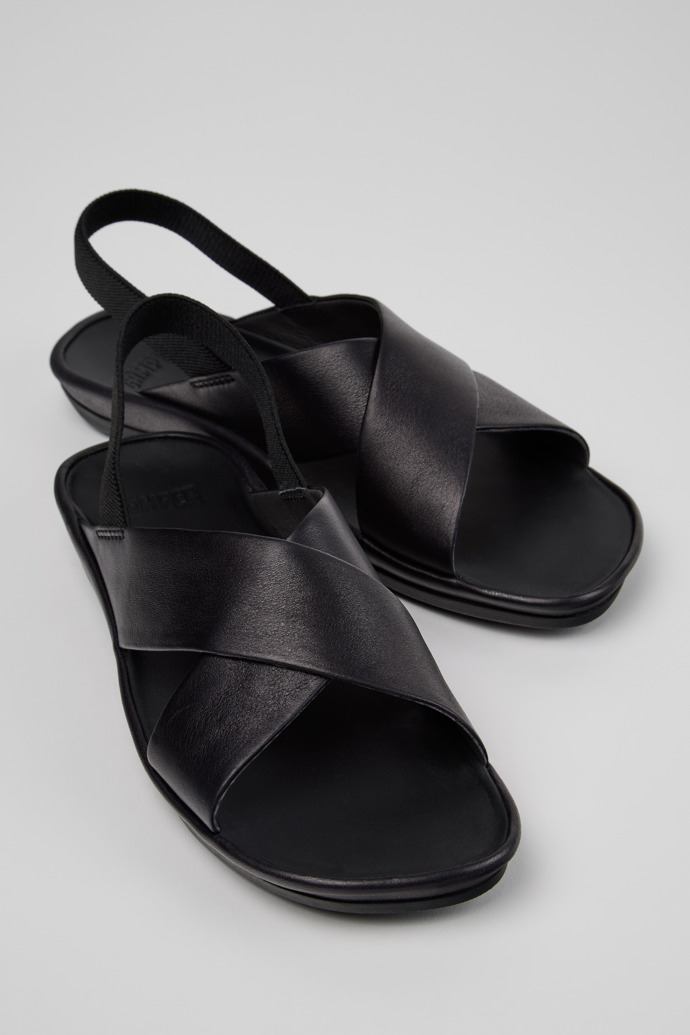 Close-up view of Right Isla Black Leather Sandals for Women.