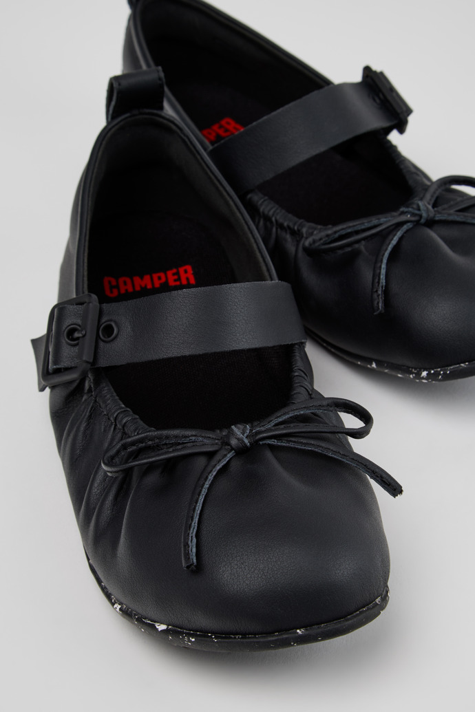 Close-up view of Wabi Black Leather Ballerinas for Women.