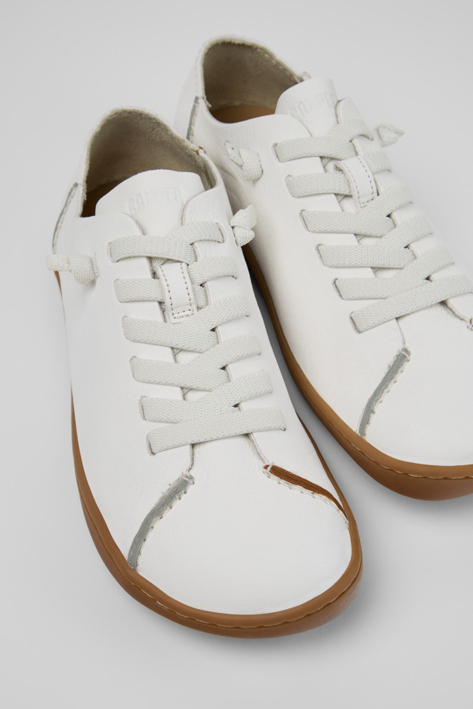 Close-up view of Twins White Leather Shoes for Women.