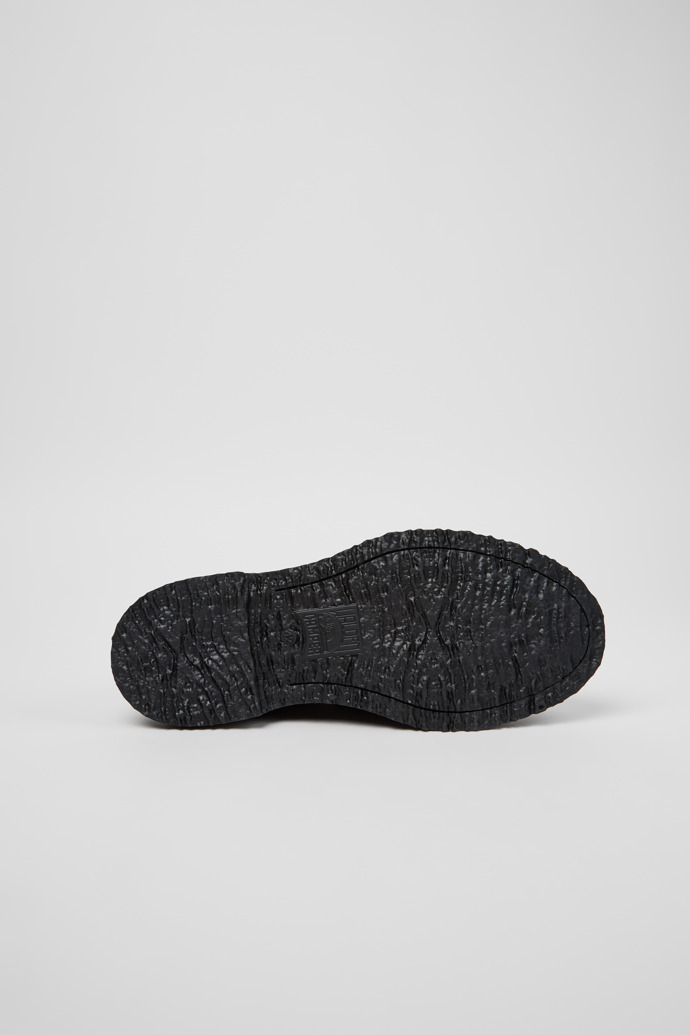 The soles of Twins Black Leather Moccasins for Women.