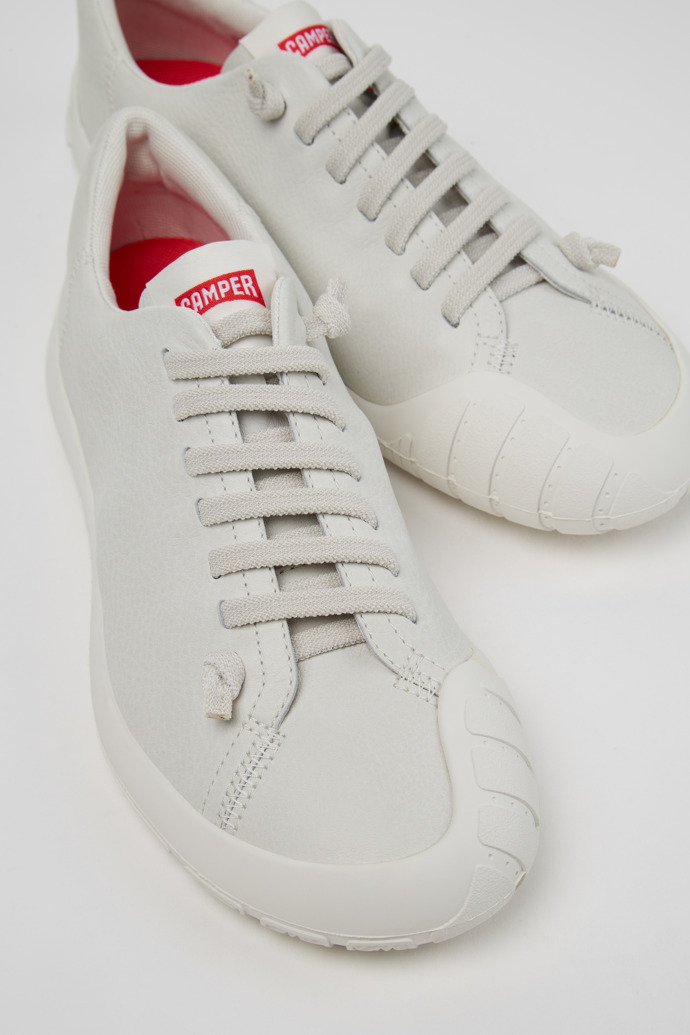 Close-up view of Peu Path+ White Leather Sneakers for Women.