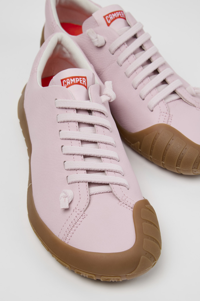 Close-up view of Peu Path+ Pink Leather Sneakers for Women.