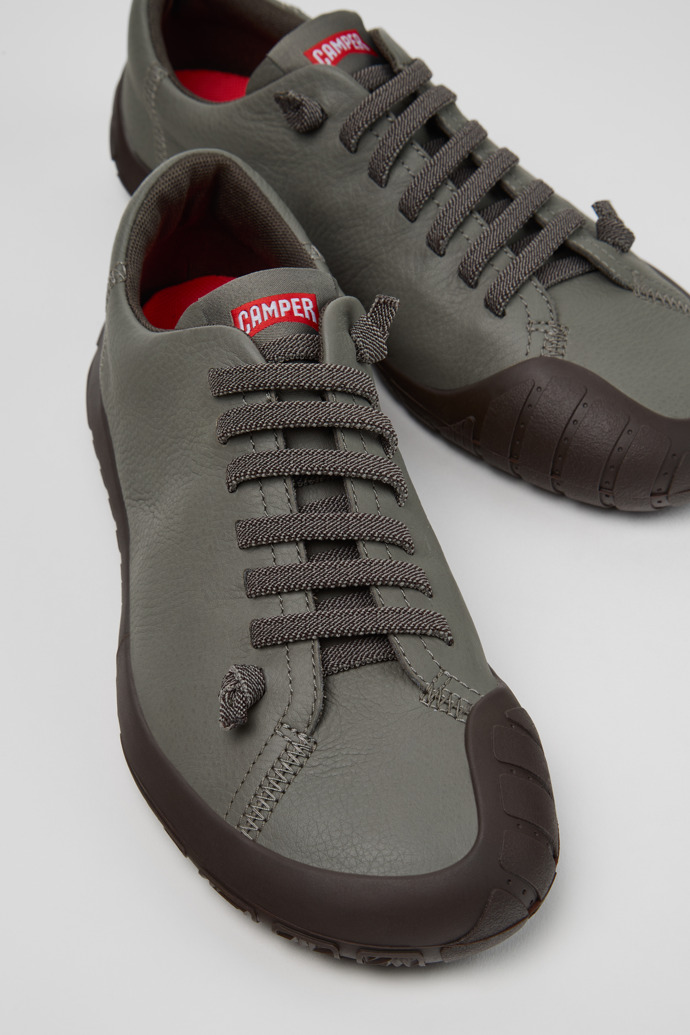 Close-up view of Peu Path+ Gray Leather Sneakers for Women.