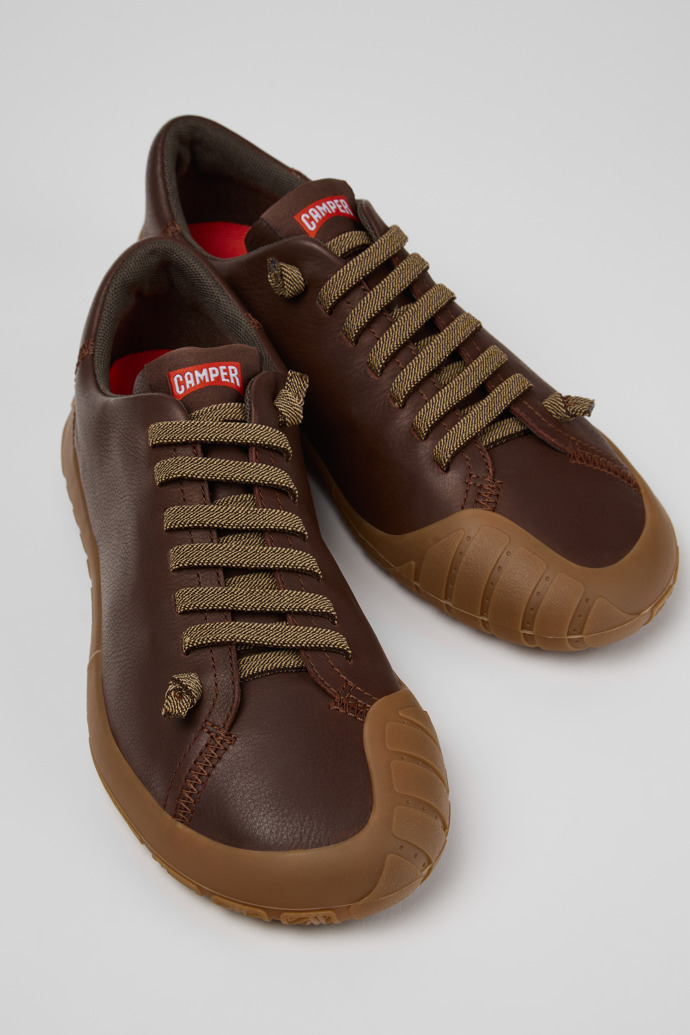 Close-up view of Peu Path+ Brown Leather Sneakers for Women.