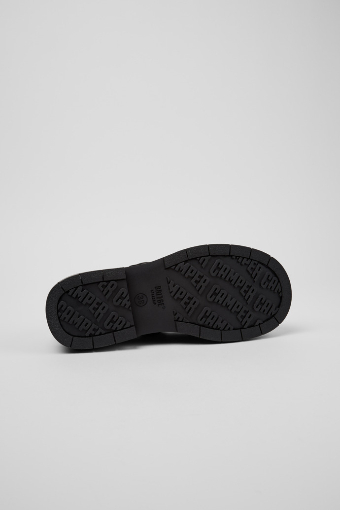 The soles of Alaro Black Leather Moccasins for Women.