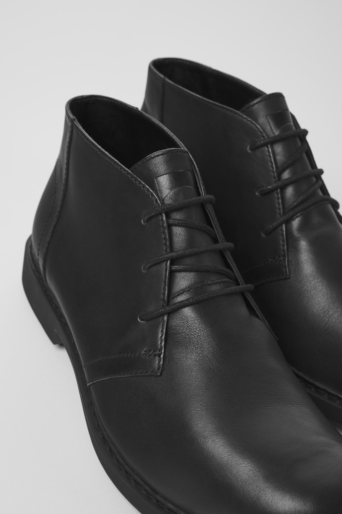 Close-up view of Neuman Men's black ankle boot