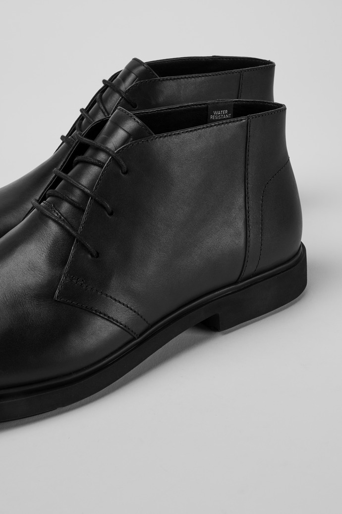 Close-up view of Neuman Black leather ankle boots for men
