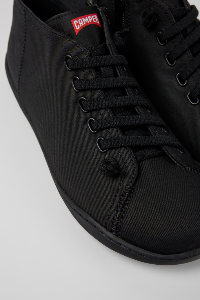 Close-up view of Peu Black textile shoes for men