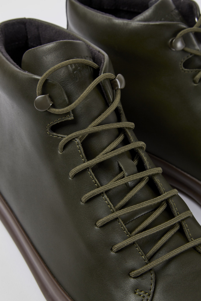 Close-up view of Chasis Dark green leather ankle boots