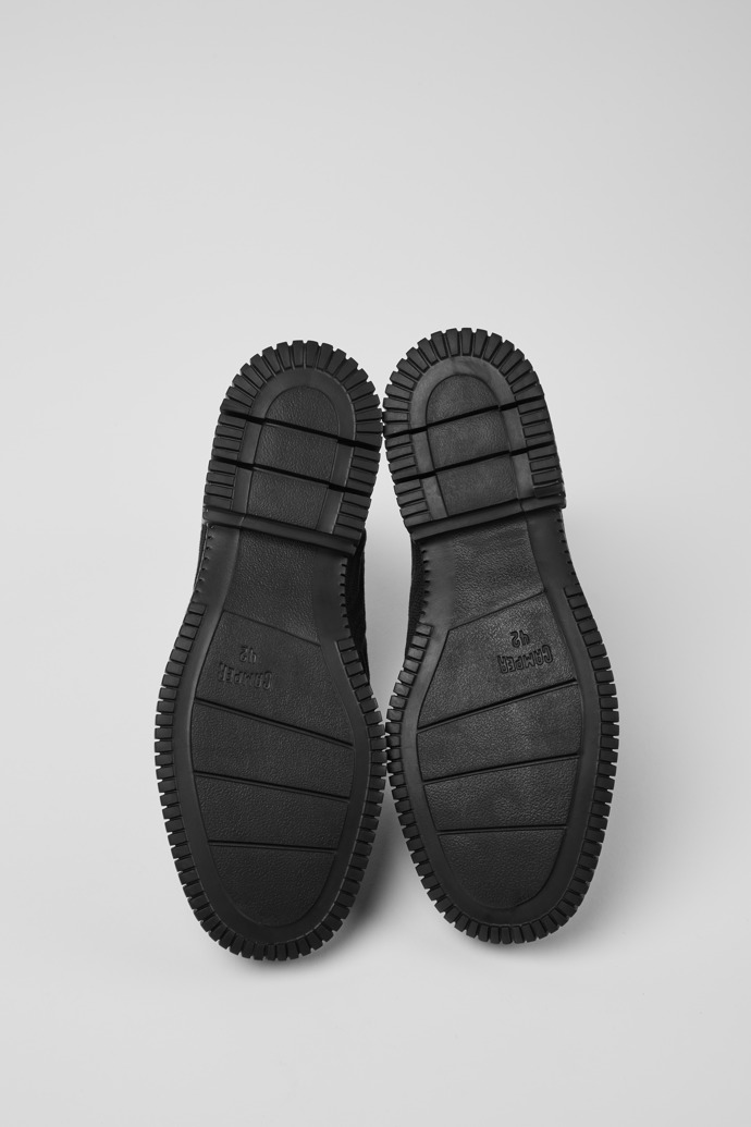 The soles of Pix Black zip boots for men