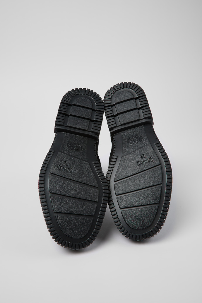 The soles of Pix Black Textile Zip Bootie for Men