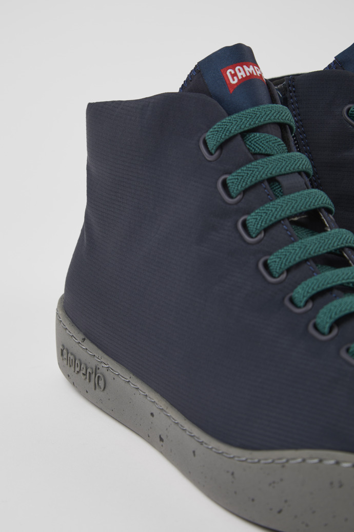 Close-up view of Peu Touring Blue textile ankle boots for men