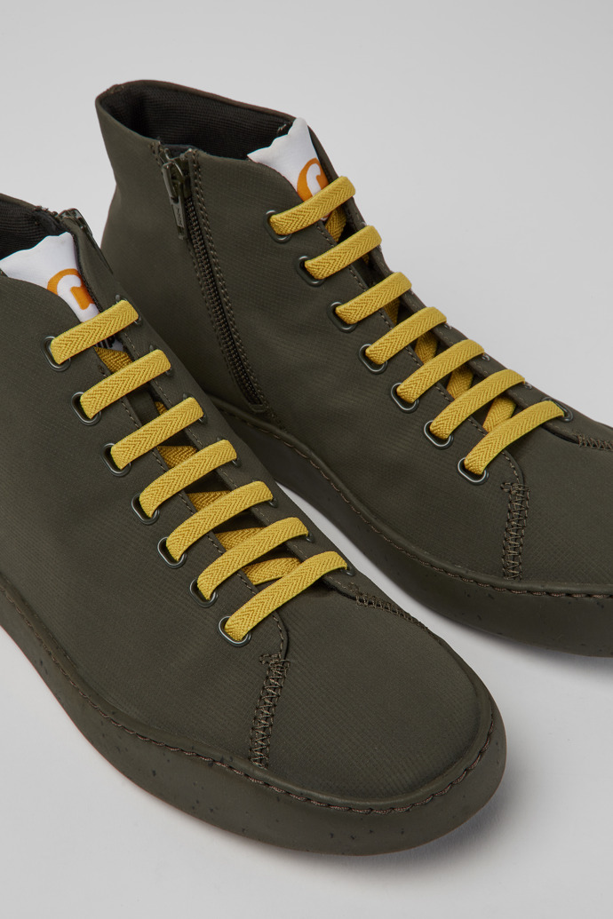 Close-up view of Peu Touring Green textile ankle boots for men