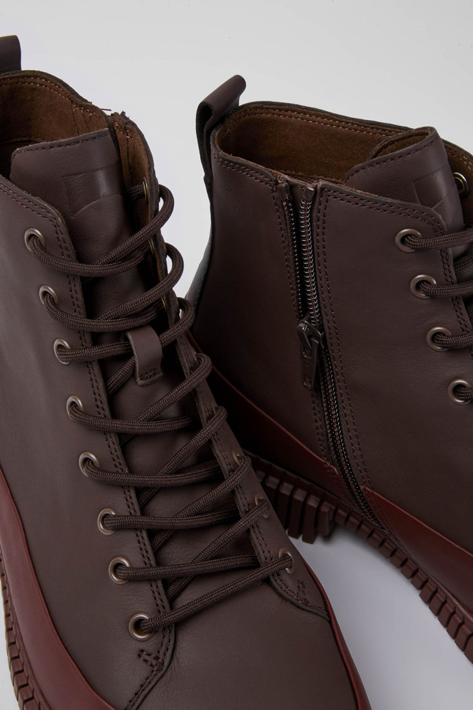 Close-up view of Pix Burgundy lace-up leather boots