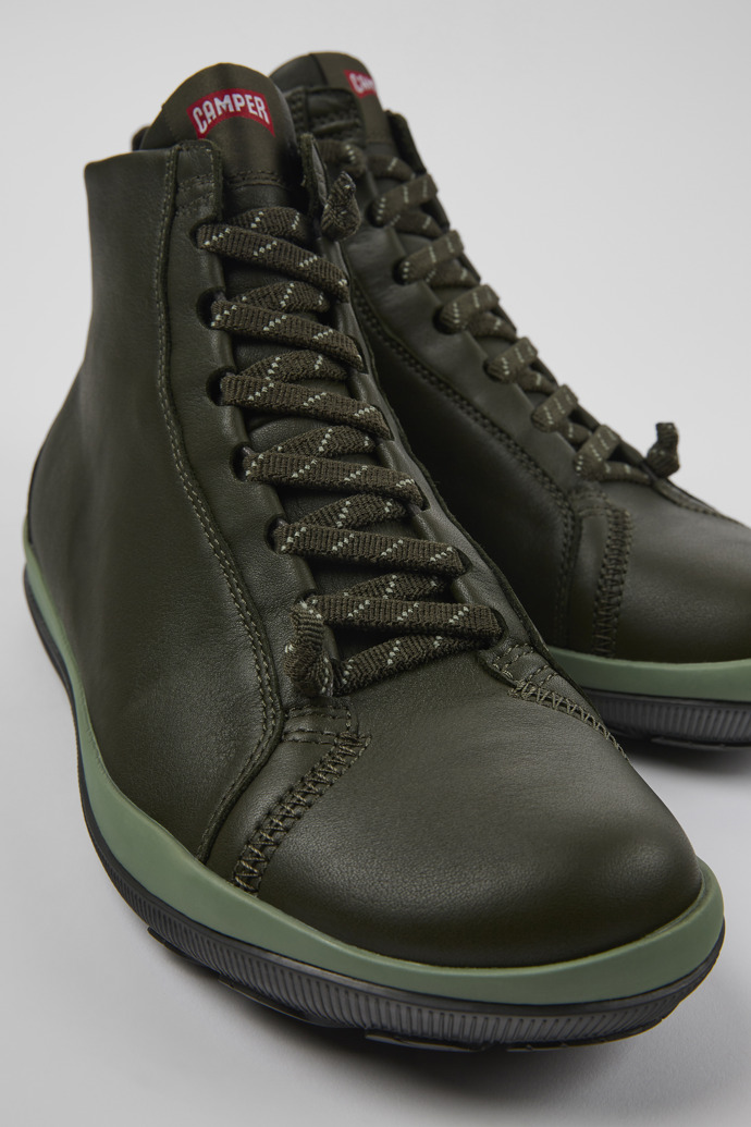 Close-up view of Peu Pista Green leather ankle boots for men