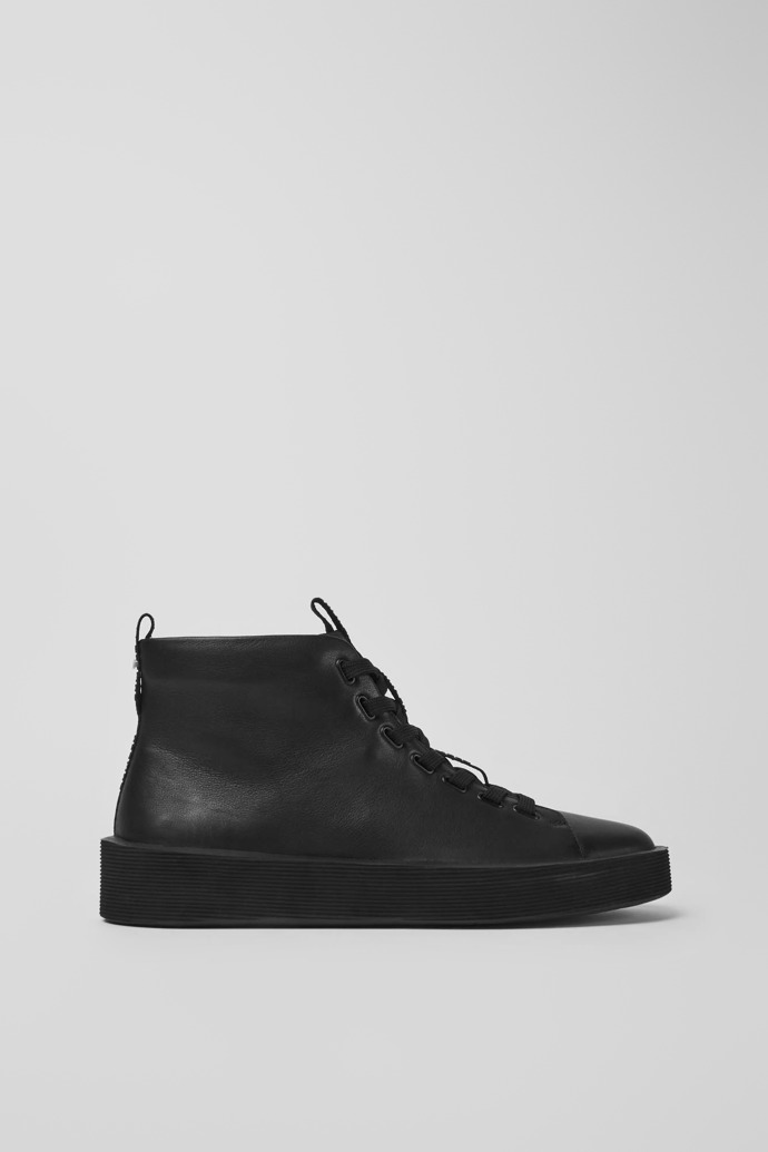 Side view of Courb Black leather ankle boots for men
