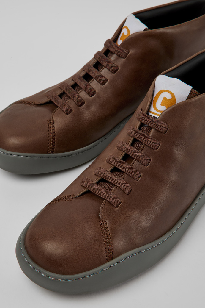 Close-up view of Peu Touring Brown leather men's sneakers