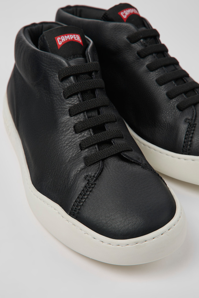 Close-up view of Peu Touring Black leather sneakers for men