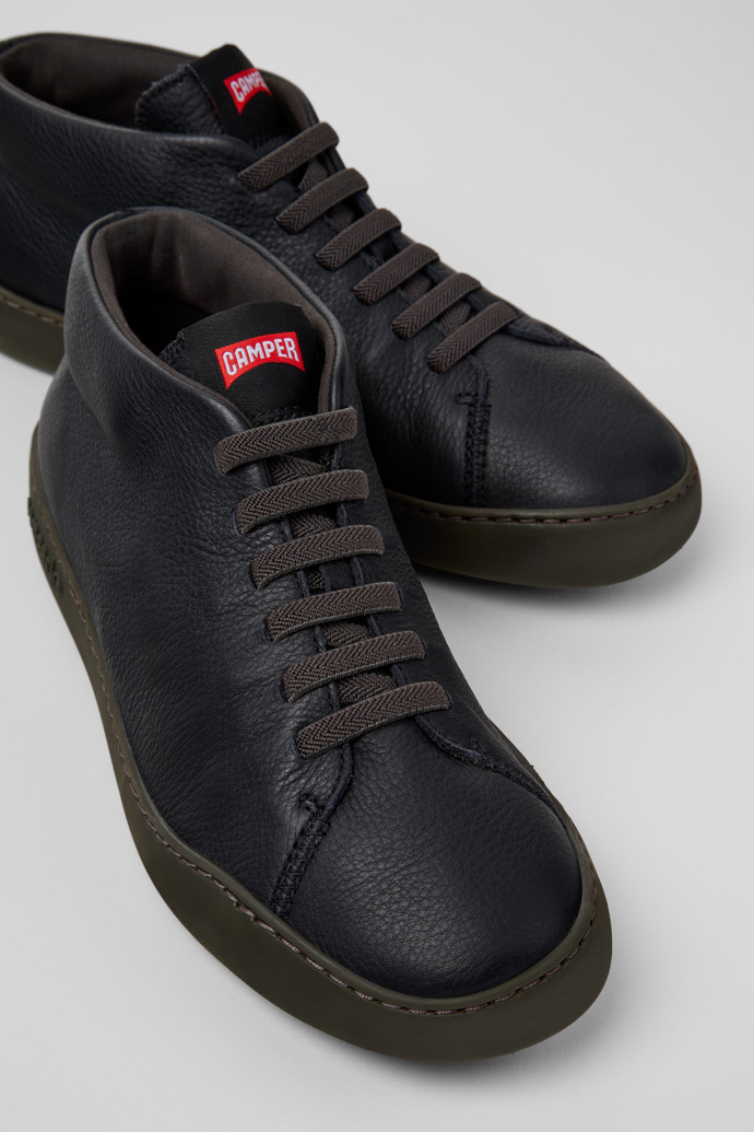 Close-up view of Peu Touring Black Leather Sneaker Boots for Men.
