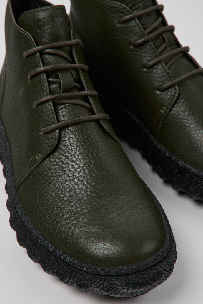 Close-up view of Ground Green-gray leather ankle boots for men