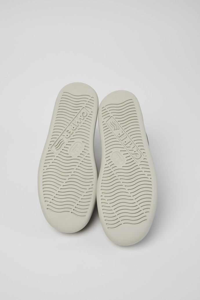 The soles of Runner Sneaker Boots for Men.