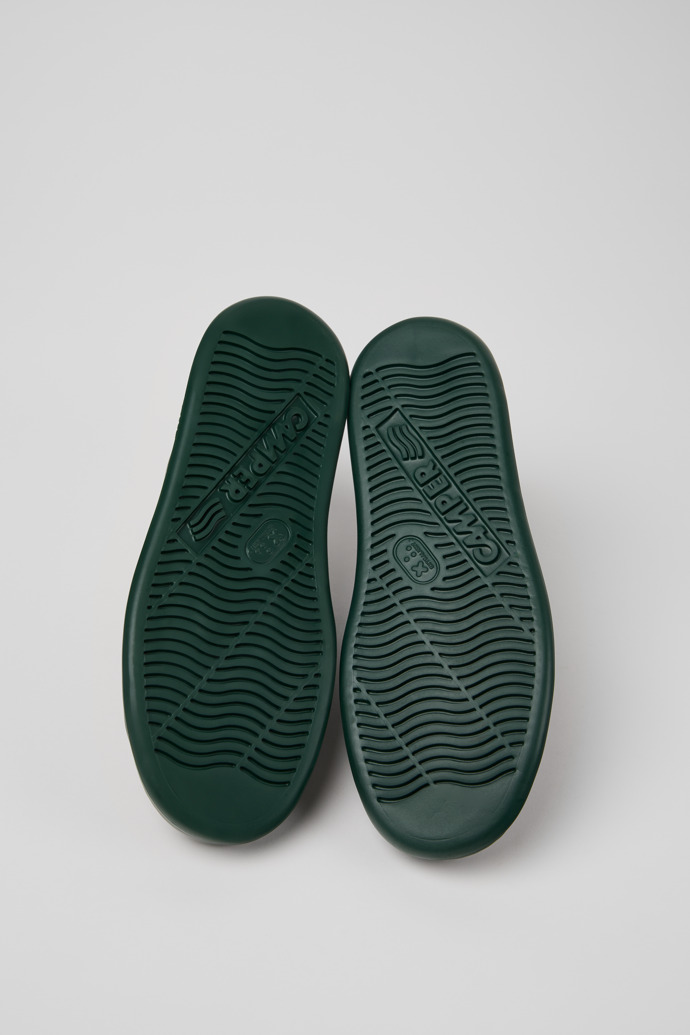 The soles of Runner Gray Leather Ankle Boots for Men.