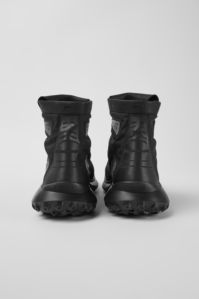 Back view of CRCLR Breathable men's black textile ankle boots