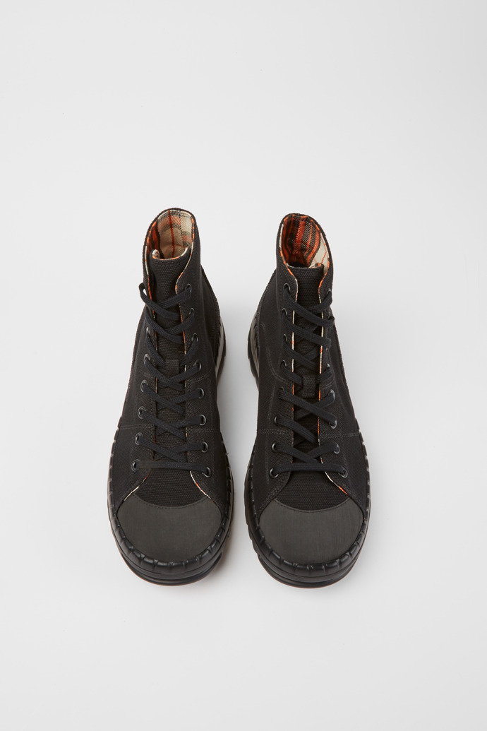 Overhead view of Teix Black rubber and BCI cotton boots