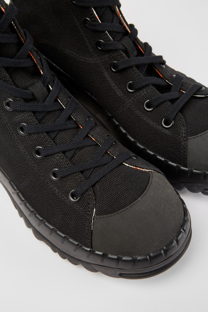 Close-up view of Teix Black rubber and BCI cotton boots