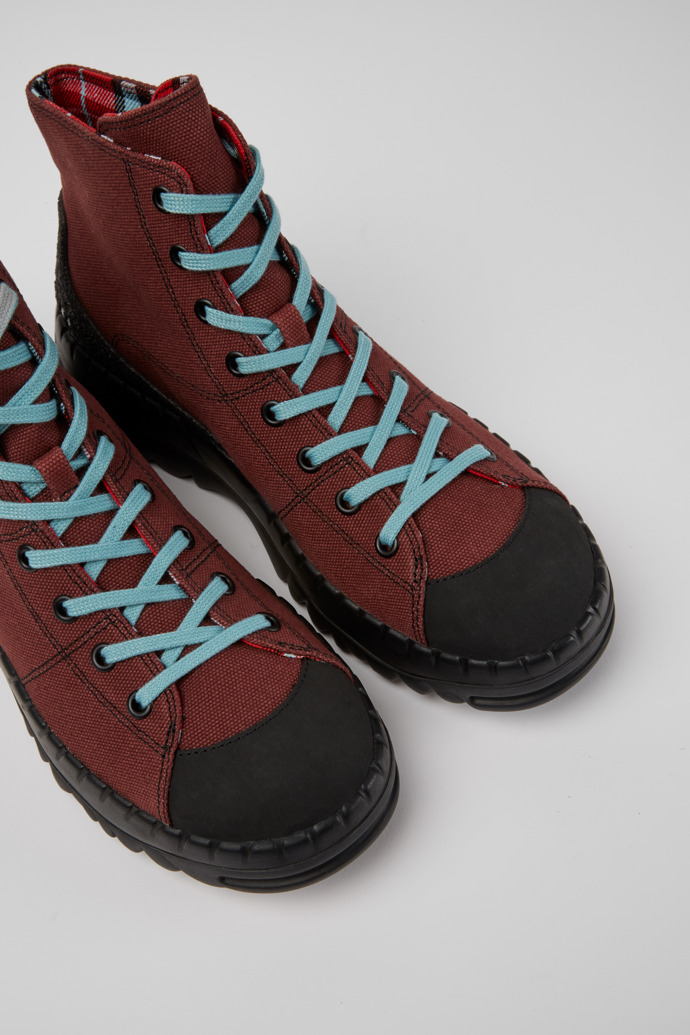 Close-up view of Teix Burgundy rubber and BCI cotton boots