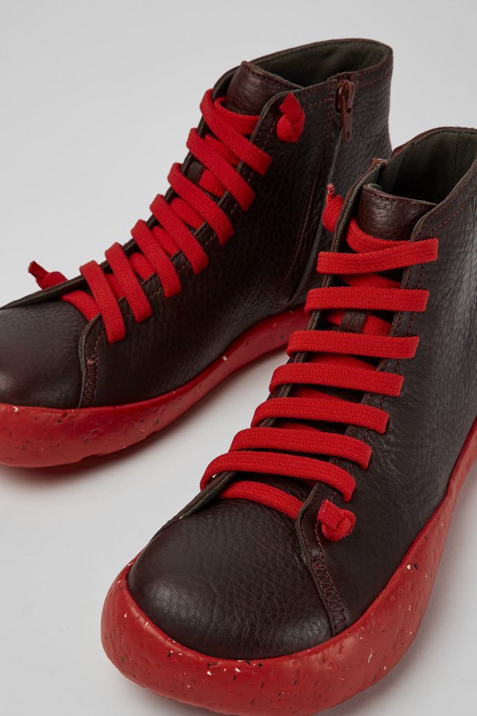 Close-up view of Peu Stadium Burgundy leather ankle boots for men
