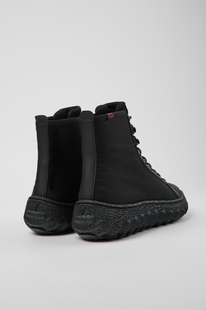 Back view of Ground PrimaLoft® Black textile and leather ankle boots for men