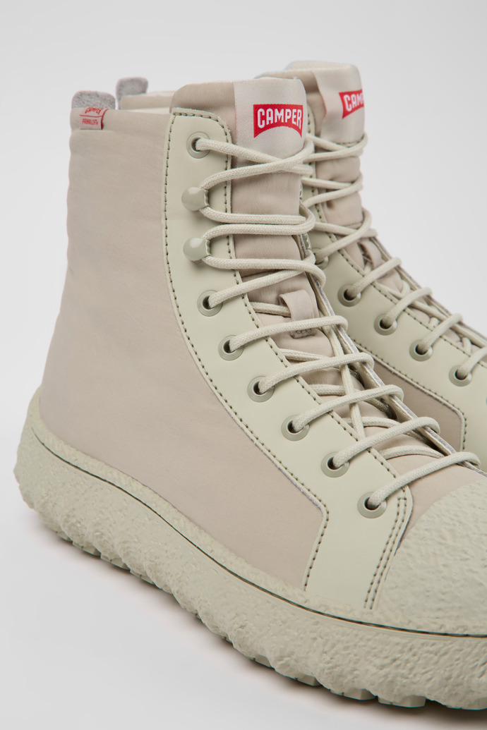 Close-up view of Ground PrimaLoft® Light gray textile and leather ankle boots for men