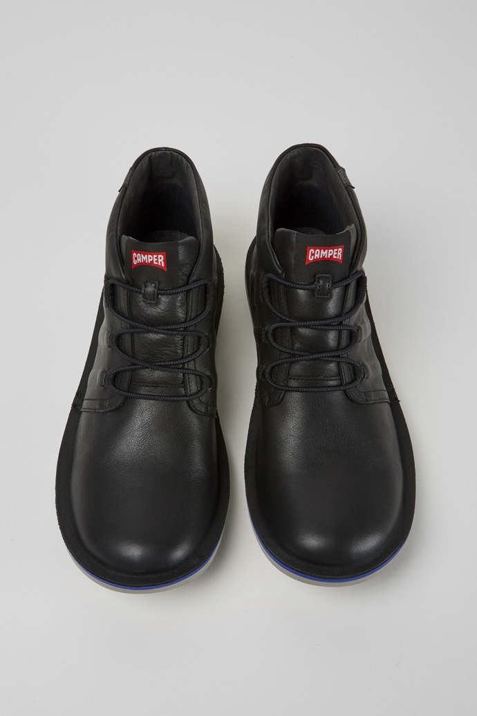 Overhead view of Beetle Black leather sneakers