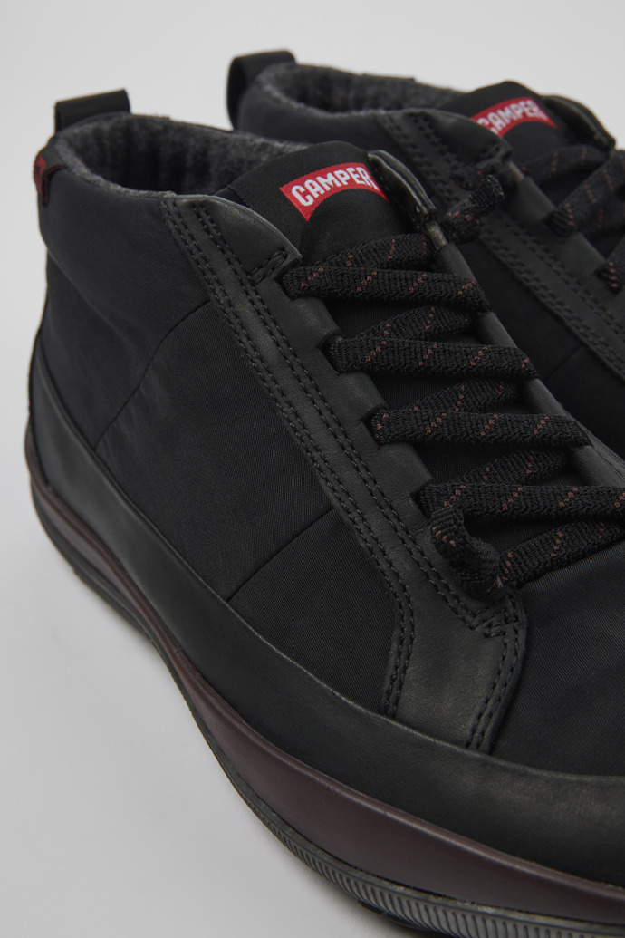 Close-up view of Peu Pista PrimaLoft® Black ankle boots for men