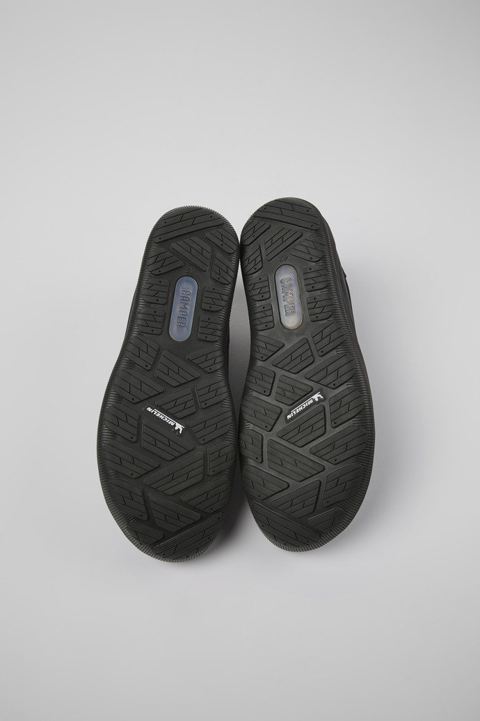 The soles of Peu Pista PrimaLoft® Black ankle boots for men