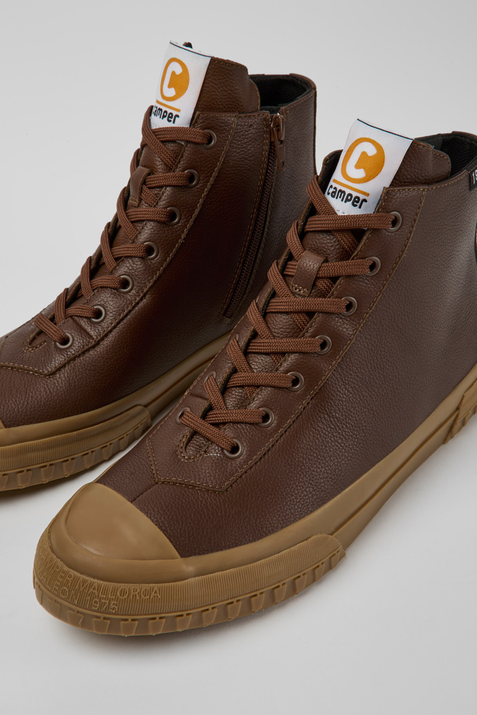 Close-up view of Camaleon Brown leather boots for men