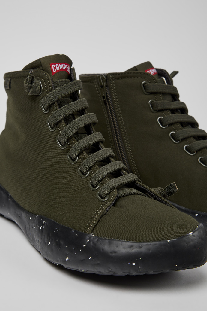 Close-up view of Peu Stadium Green ankle boots for men