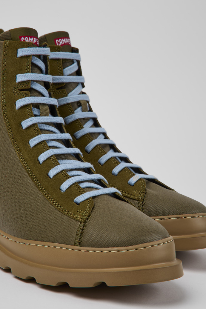 Close-up view of Brutus Green boots for men