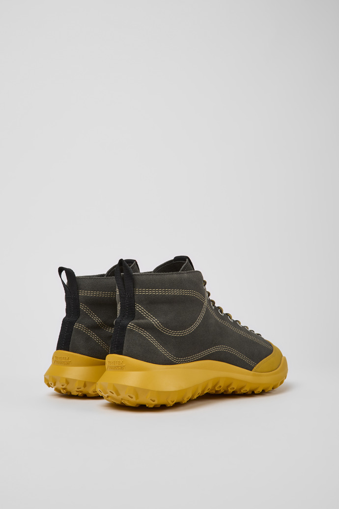 Back view of CRCLR Gray and yellow nubuck ankle boots for men