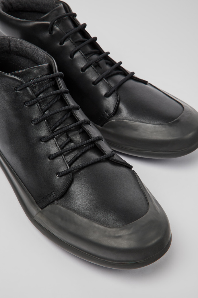 Close-up view of Chasis Black leather ankle boots for men