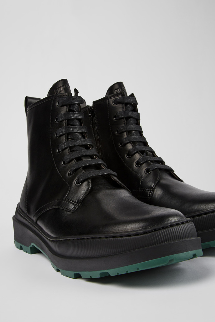 Close-up view of Brutus Trek Black leather medium boots for men