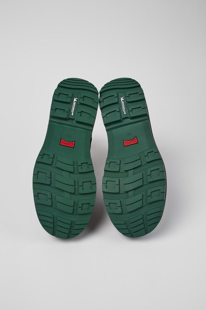 The soles of Brutus Trek Black leather medium boots for men