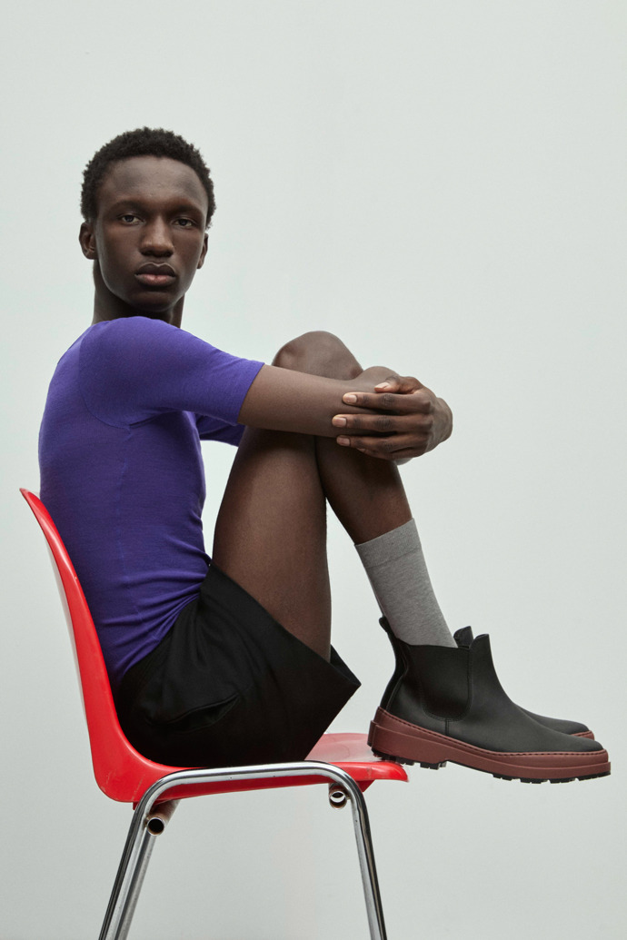 A model wearing Brutus Trek MICHELIN Black nubuck ankle boots for men