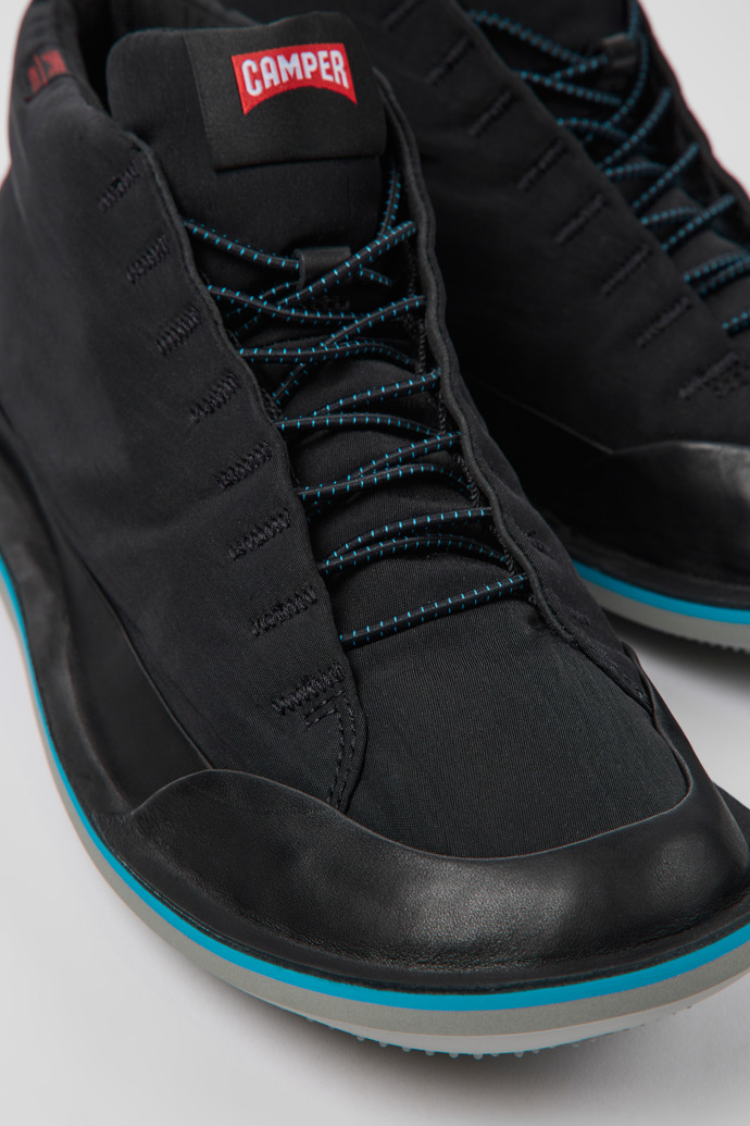Close-up view of Beetle PrimaLoft® Black textile and nubuck ankle boots for men