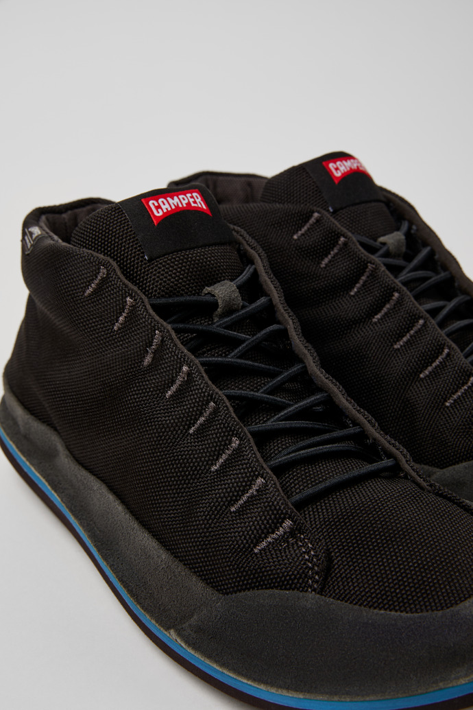 Close-up view of Beetle Black Textile and Nubuck Ankle Boots for Men.
